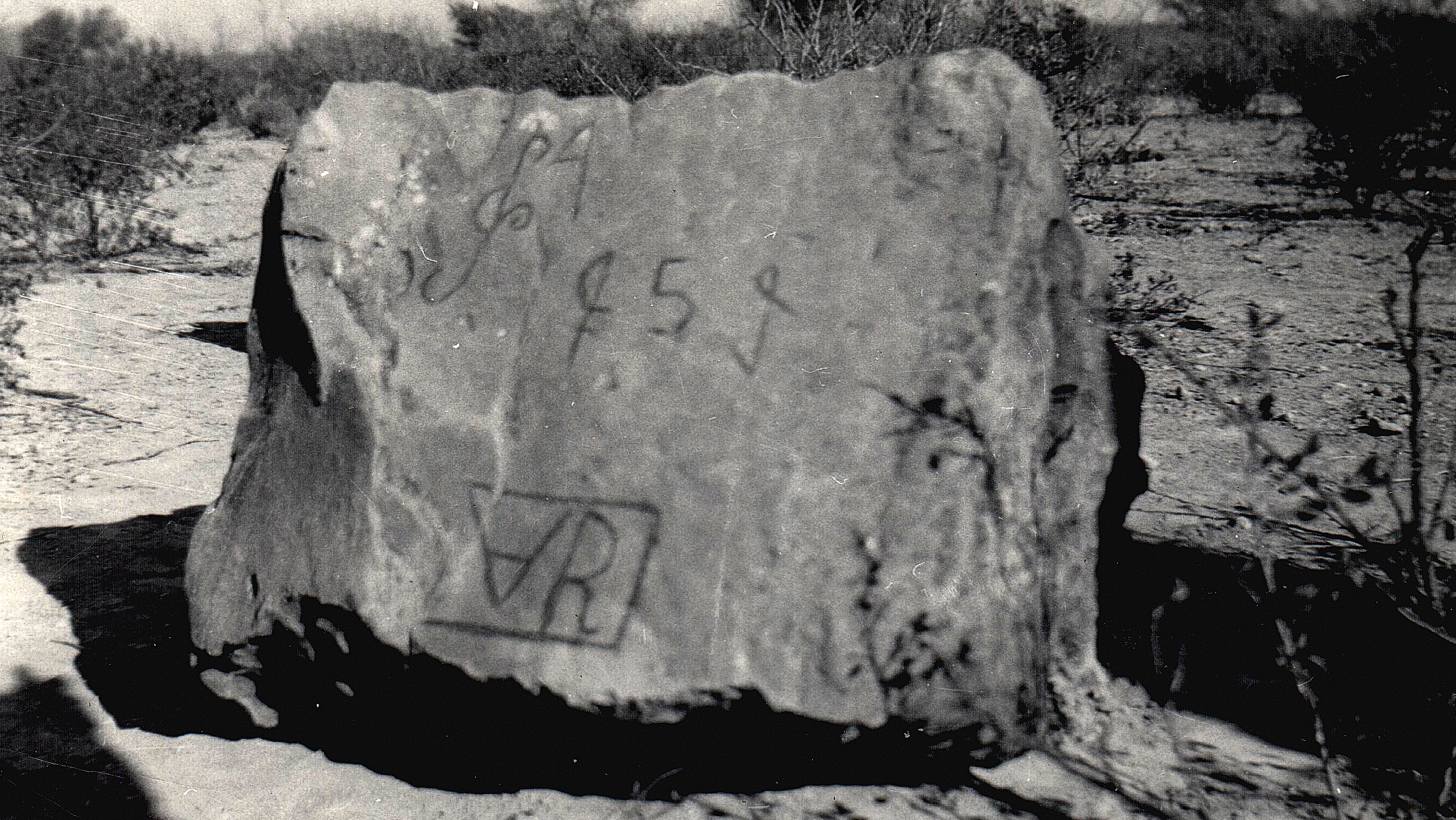 Boulder near Coahuila, Mexico, etched with marks resembling Cherokee syllabary characters.